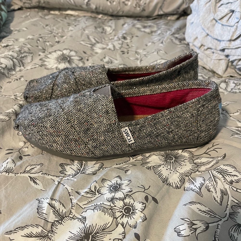 Toms Black and White Slip-Ons, size 7